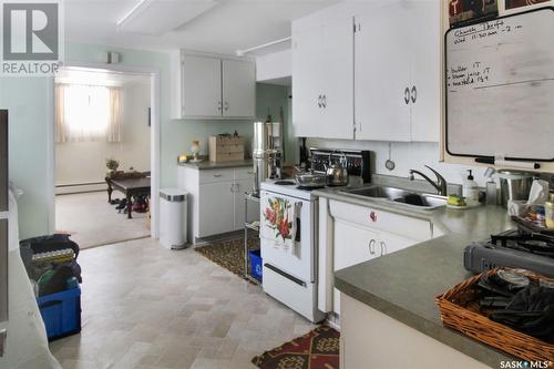 235 Sidney Street, Swift Current, SK - Indoor Photo Showing Kitchen With Double Sink