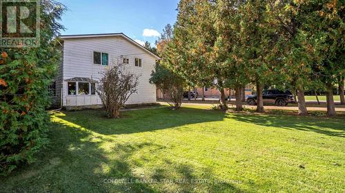 Imagine a full length porch at the front. - 3109 Napperton Drive, Adelaide Metcalfe, ON - Outdoor