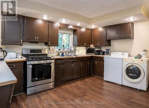 Kitchen open kitchen/dining area. - 3109 Napperton Drive, Adelaide Metcalfe, ON - Indoor Photo Showing Laundry Room