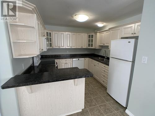 A 4415 Heritage Crescent, Fort Nelson, BC - Indoor Photo Showing Kitchen