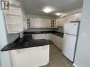 A 4415 Heritage Crescent, Fort Nelson, BC  - Indoor Photo Showing Kitchen 