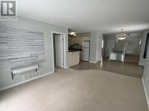 A 4415 Heritage Crescent, Fort Nelson, BC - Indoor Photo Showing Other Room