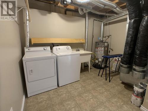 A 4415 Heritage Crescent, Fort Nelson, BC - Indoor Photo Showing Laundry Room