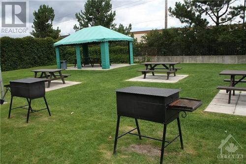 BBQ area in the summer. - 3100 Carling Avenue Unit#907, Ottawa, ON - Outdoor With Backyard