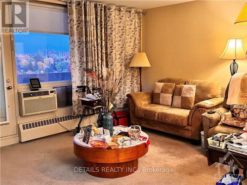 907 - 3100 Carling Avenue, Ottawa, ON - Indoor Photo Showing Living Room