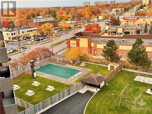 View from the balcony. North-East view of the city and Pool area. - 3100 Carling Avenue Unit#907, Ottawa, ON - Outdoor