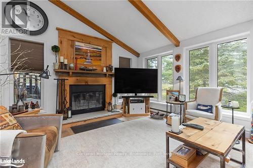 2517 Honey Harbour Road, Georgian Bay (Baxter), ON - Indoor Photo Showing Living Room With Fireplace