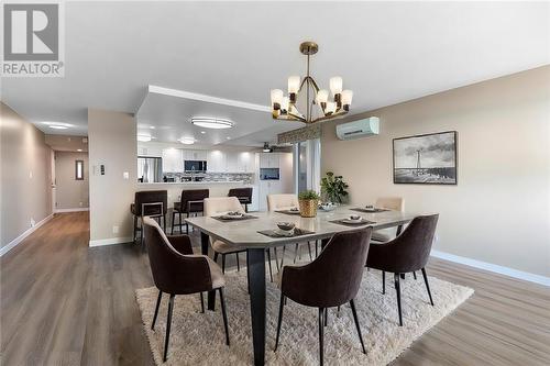 Virtually Staged - 55 Water Street E Unit#103, Brockville, ON - Indoor Photo Showing Dining Room