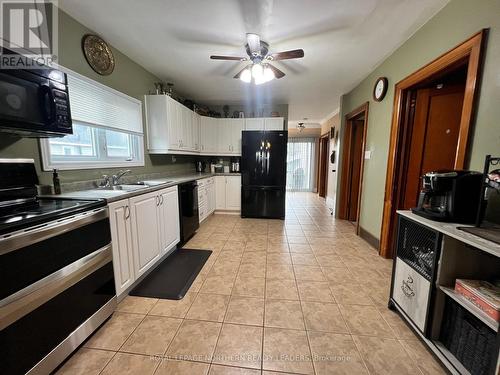 301 Birch Street N, Timmins, ON - Indoor Photo Showing Kitchen With Double Sink