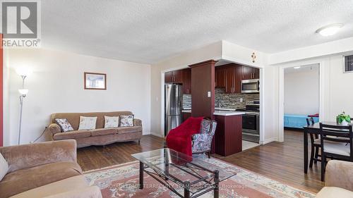 2002 - 3590 Kaneff Crescent, Mississauga, ON - Indoor Photo Showing Living Room