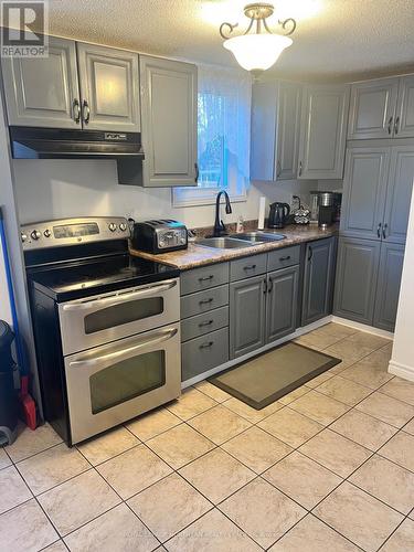 626 Mountjoy Street S, Timmins, ON - Indoor Photo Showing Kitchen With Double Sink