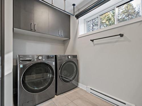 Bathroom - 975 Rue Manolakos, Val-David, QC - Indoor Photo Showing Laundry Room