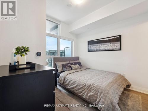 323 - 50 George Butchart Drive, Toronto, ON - Indoor Photo Showing Bedroom