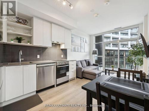 323 - 50 George Butchart Drive, Toronto, ON - Indoor Photo Showing Kitchen