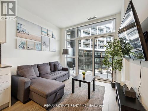 323 - 50 George Butchart Drive, Toronto, ON - Indoor Photo Showing Living Room