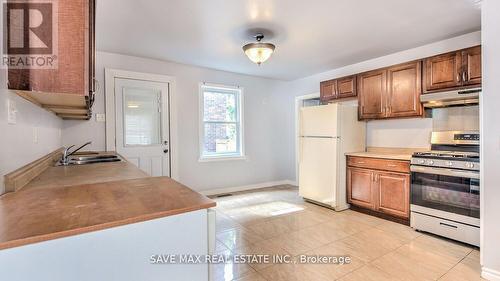 713 Adelaide Street N, London, ON - Indoor Photo Showing Kitchen With Double Sink