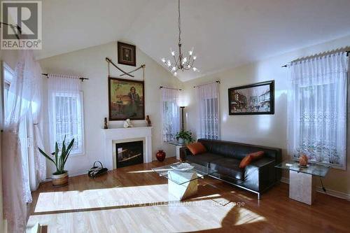 26 Clubhouse Drive, Collingwood, ON - Indoor Photo Showing Living Room With Fireplace