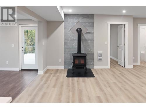 3685 Foster Road, Creston, BC - Indoor Photo Showing Other Room With Fireplace