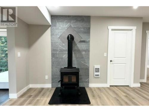 3685 Foster Road, Creston, BC - Indoor Photo Showing Living Room With Fireplace