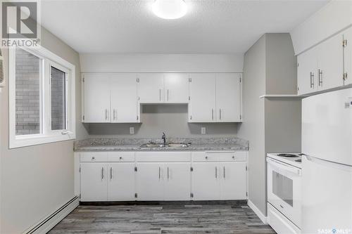 2235 8Th Avenue N, Regina, SK - Indoor Photo Showing Kitchen With Double Sink