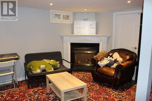 27 Pugsley Avenue, Richmond Hill, ON - Indoor Photo Showing Living Room With Fireplace