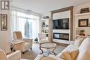 105 - 90 Orchard Point, Orillia, ON  - Indoor Photo Showing Living Room With Fireplace 