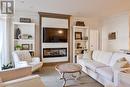 105 - 90 Orchard Point, Orillia, ON  - Indoor Photo Showing Living Room With Fireplace 