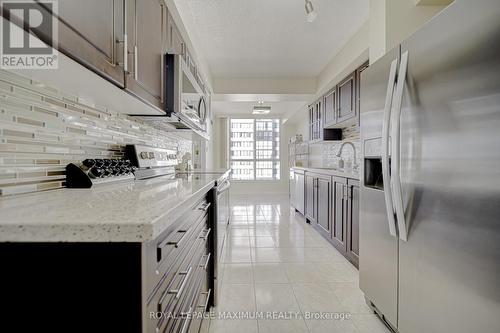 908 - 2901 Kipling Avenue, Toronto, ON - Indoor Photo Showing Kitchen