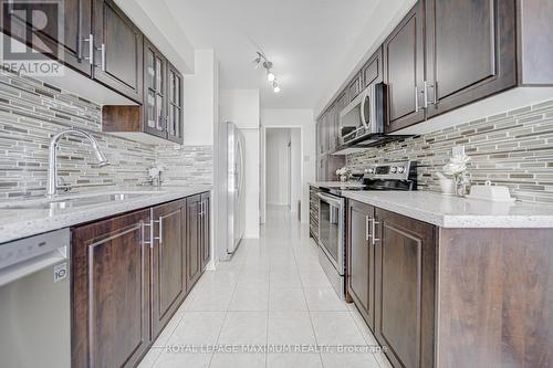 908 - 2901 Kipling Avenue, Toronto, ON - Indoor Photo Showing Kitchen With Upgraded Kitchen