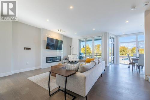 201 Wylie Street Unit# 104, Penticton, BC - Indoor Photo Showing Living Room With Fireplace