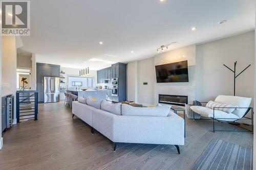 201 Wylie Street Unit# 104, Penticton, BC - Indoor Photo Showing Living Room With Fireplace