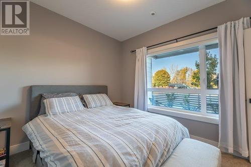 201 Wylie Street Unit# 104, Penticton, BC - Indoor Photo Showing Bedroom