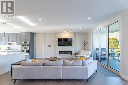 201 Wylie Street Unit# 104, Penticton, BC - Indoor Photo Showing Living Room With Fireplace