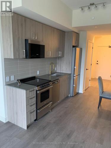 306 - 8010 Derry Road, Milton, ON - Indoor Photo Showing Kitchen With Stainless Steel Kitchen With Upgraded Kitchen