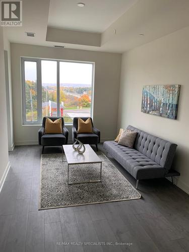 306 - 8010 Derry Road, Milton, ON - Indoor Photo Showing Living Room