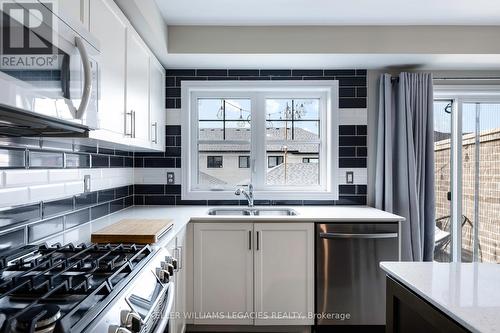 19 Sudeley Lane, Brampton, ON - Indoor Photo Showing Kitchen With Double Sink