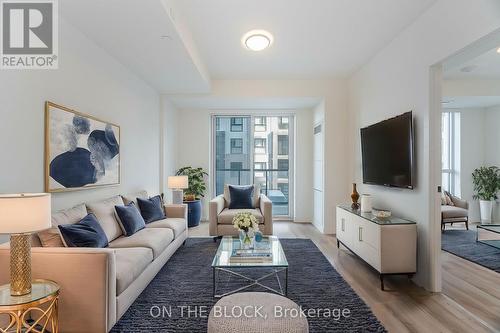 208 - 345 Wheat Boom Drive, Oakville, ON - Indoor Photo Showing Living Room