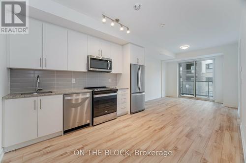 208 - 345 Wheat Boom Drive, Oakville, ON - Indoor Photo Showing Kitchen With Stainless Steel Kitchen