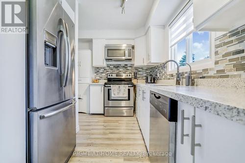 1 - 413 Bairstow Crescent, Waterloo, ON - Indoor Photo Showing Kitchen With Upgraded Kitchen