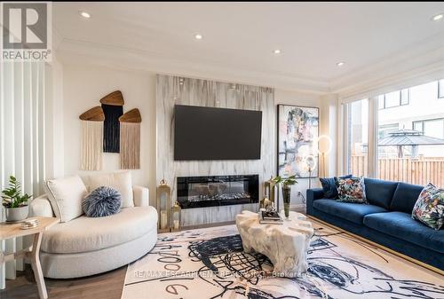 128 Fairey Crescent, Hamilton, ON - Indoor Photo Showing Living Room With Fireplace