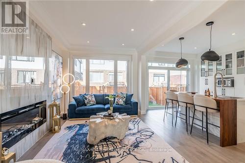 128 Fairey Crescent, Hamilton, ON - Indoor Photo Showing Living Room With Fireplace