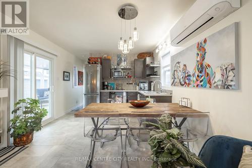 dining room and kitchen - E40 - 4340 Cromarty Drive N, Thames Centre (Mossley), ON - Indoor Photo Showing Dining Room