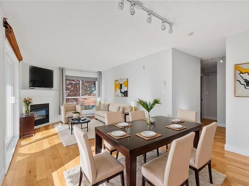 301-1028 Balmoral Rd, Victoria, BC - Indoor Photo Showing Dining Room With Fireplace