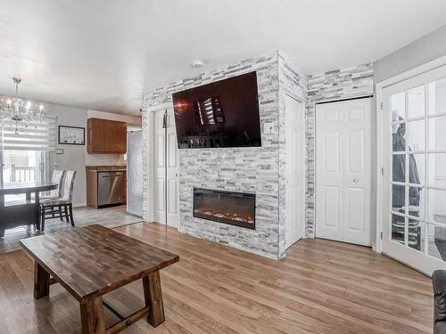 Living room - 990 9E Avenue, Laval (Fabreville), QC - Indoor Photo Showing Living Room With Fireplace