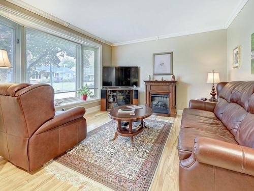 Salon - 3445 Carré De Nevers, Québec (Sainte-Foy/Sillery/Cap-Rouge), QC - Indoor Photo Showing Living Room With Fireplace