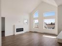 401-9716 Third St, Sidney, BC  - Indoor Photo Showing Living Room With Fireplace 