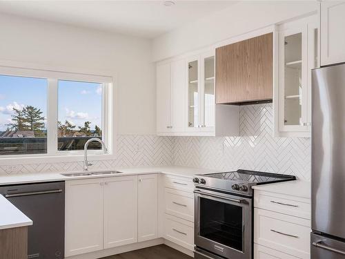 401-9716 Third St, Sidney, BC - Indoor Photo Showing Kitchen With Stainless Steel Kitchen With Double Sink With Upgraded Kitchen