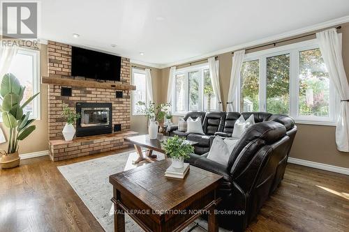 3580 Linda Street, Innisfil, ON - Indoor Photo Showing Living Room With Fireplace