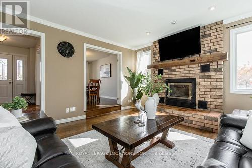 3580 Linda Street, Innisfil, ON - Indoor Photo Showing Living Room With Fireplace