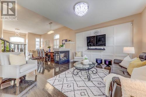 65 Mansbridge Crescent, Ajax, ON - Indoor Photo Showing Living Room With Fireplace